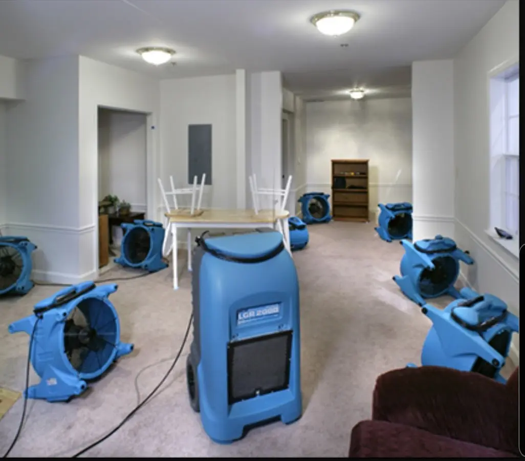 Air movers and dehumidifier setup for Water Damage Restoration in Barling